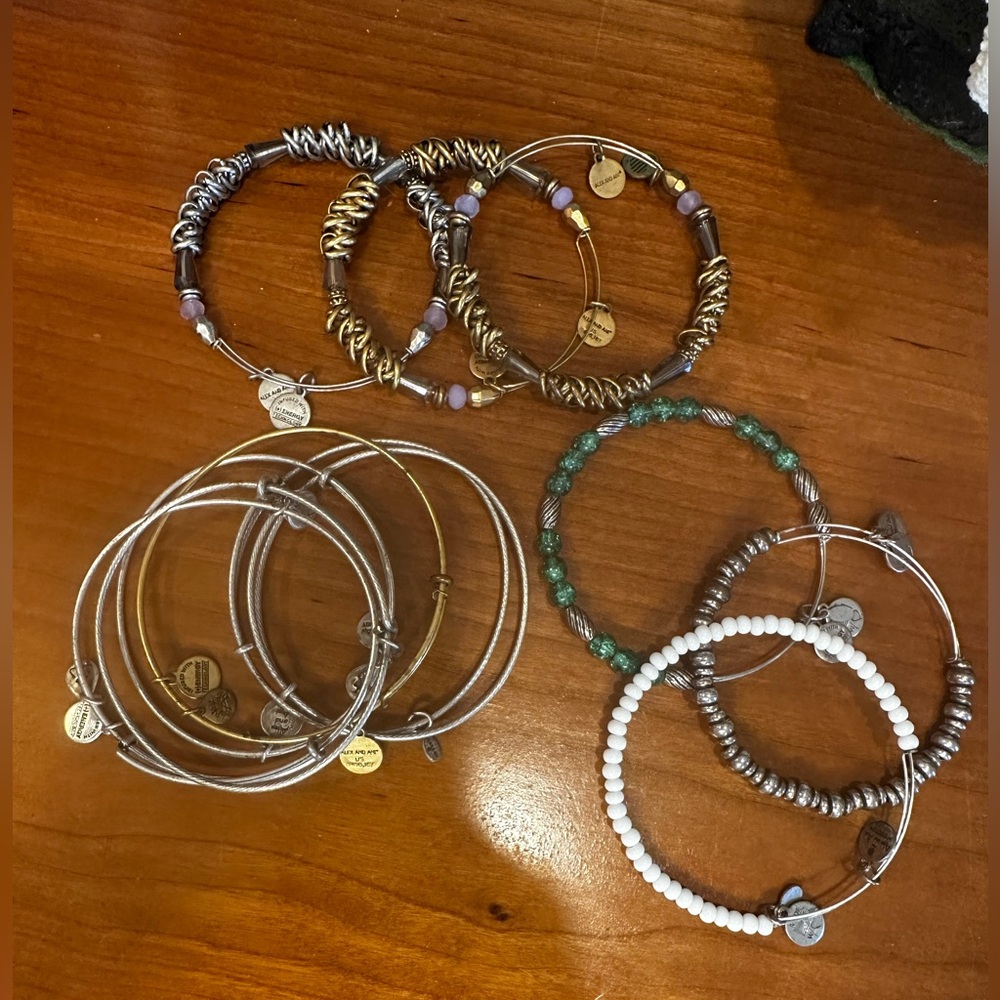 Collection of 18 Alex and Ani Energy Infused Bracelets
